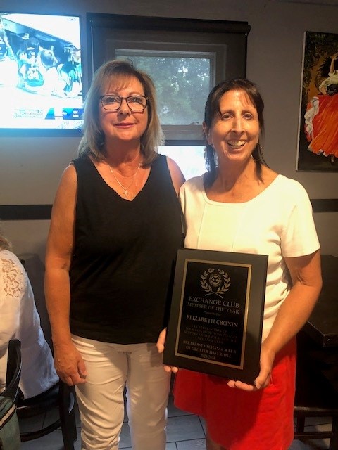 Elizabeth "Liz" Cronin receiving an award.